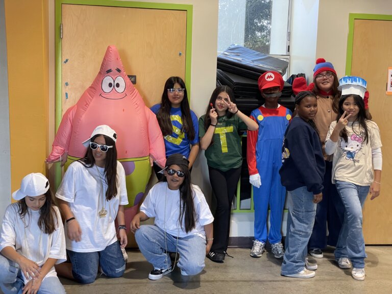 Students dressed in costumes for a school spirit day